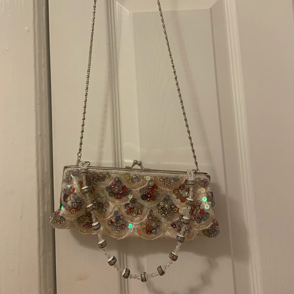 Woman’s clutch/handbag with chain